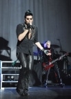 Adam Lambert performs on stage at JCB Hall on October 6, 2010 in Tokyo, Japan.