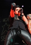 Adam Lambert performs on stage at JCB Hall on October 6, 2010 in Tokyo, Japan.