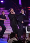 AMERICAN IDOL: The Idol top 12 boys perform with special guest Tom Jones during the season ten AMERICAN IDOL GRAND FINALE at the Nokia Theatre on Weds. May 25, 2011 in Los Angeles, California. CR: Michael Becker/FOX