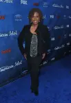 AMERICAN IDOL: AMERICAN IDOL Vocal Coach Debra Byrd arrives on the red carpet at the AMERICAN IDOL TOP 13 FINALIST PARTY on Thursday, March 3 at The Grove in Los Angeles, CA.