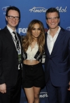 AMERICAN IDOL: (L-R) Peter Rice Chairman, Entertainment Fox Networks Group, Jennifer Lopez, and Kevin Reilly, President, Entertainment, FOX Broadcasting arrive on the red carpet at the AMERICAN IDOL TOP 13 FINALIST PARTY on Thursday, March 3 at The Grove in Los Angeles, CA.