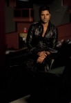 GLEE: Behind the scenes with John Stamos during the filming of "The Rocky Horror Glee Show" episode of GLEE airing Tuesday, Oct. 26 (8:00-9:01 PM ET/PT) on FOX. Â©2010 Fox Broadcasting Co. Cr: Adam Rose/FOX
