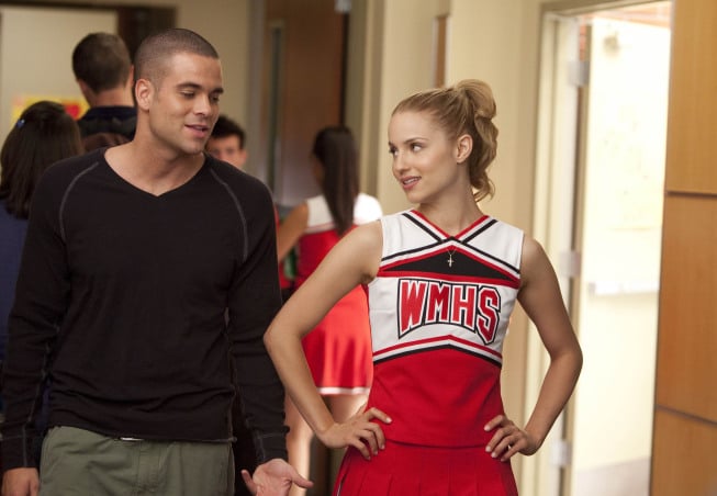 GLEE: Puck (Mark Salling, L) tries to get Quinn's (Dianna Agron, R) attention in "Audition," the season premiere episode of GLEE airing Tuesday, Sept. 21 (8:00-9:00 PM ET/PT) on FOX. Also pictured: ©2010 Fox Broadcasting Co. Cr: Adam Rose/FOX