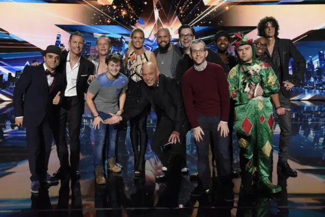 AMERICA'S GOT TALENT -- Episode 1024 -- Pictured: (l-r) Uzeyer Novruzov, Paul Zerdin, The Professional Regurgitator, Drew Lynch, Heidi Klum, Howie Mandel, Benton Blount, Derek Hughes, Gary Vider, The CraigLewis Band, Piff the Magic Dragon, Howard Stern -- (Photo by: Peter Kramer/NBC)