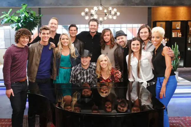 THE VOICE -- "Team Blake Battle Reality" -- Pictured: (l-r) Cole Criske, Zach Seabaugh, Barrett Baber, Emily Ann Roberts, Chris Crump, Blind Joe Bommersbach, Blake Shelton, Morgan Frazier, Tyler Dickerson, Dustin Christensen, Krista Hughes, Blaine Mitchell, Nadjah Nicole -- (Photo by: Trae Patton/NBC) Monday, October 5 on NBC (8-10 p.m. ET)