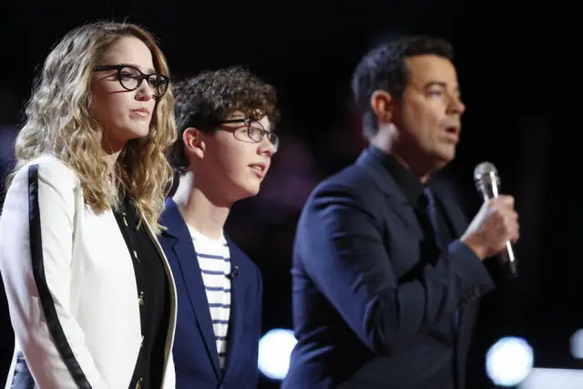 THE VOICE -- "Live Top 10" Episode 916B -- Pictured: (l-r) Korin Bukowski, Braiden Sunshine, Carson Daly -- (Photo by: Trae Patton/NBC)