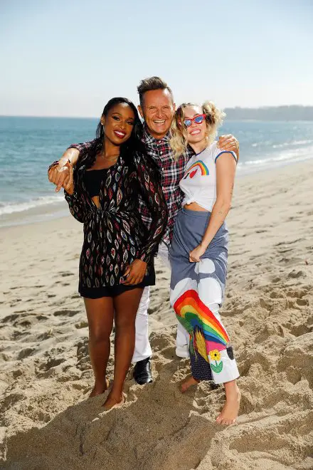 THE VOICE -- "Press Junket" -- First-time coach Jennifer Hudson and returning coach Miley Cyrus flank executive producer Mark Burnett on the shores of the Pacific Ocean as the trio gear up for the 13th season of ?The Voice.? The three-time Emmy Award-winning series premieres on Monday, Sept. 25 (8-10 p.m. ET/PT) -- (Photo by: Trae Patton/NBC)