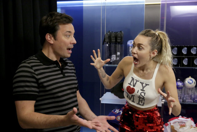 THE TONIGHT SHOW STARRING JIMMY FALLON -- Episode 0750 -- Pictured: (l-r) Host Jimmy Fallon with Singer/Songwriter Miley Cyrus during "Photobomb" on October 3, 2017 -- (Photo by: Andrew Lipovsky/NBC)