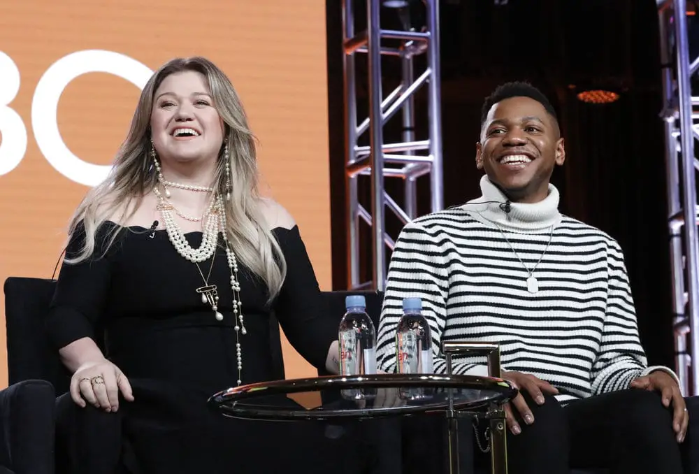 NBCUNIVERSAL EVENTS -- NBCUniversal Press Tour, January 2018 -- NBC's "The Voice" Session -- Pictured: (l-r) Kelly Clarkson, Coach; Chris Blue, Season 12 Winner -- (Photo by: Evans Vestal Ward/NBCUniversal)