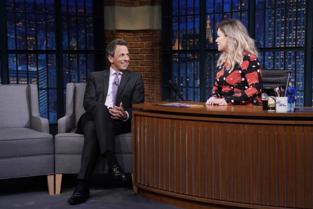 LATE NIGHT WITH SETH MEYERS -- Episode 736 -- Pictured: (l-r) Host Seth Meyers gets interviewed by singer Kelly Clarkson on September 20, 2018 -- (Photo by: Lloyd Bishop/NBC)