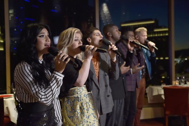 PENTATONIX: A NOT SO SILENT NIGHT -- 2018 -- Pictured: (l-r) Kirstin Maldonado, Kelly Clarkson, Mitch Grassi, Matt Sallee, Kevin Olusola, Scott Hoying -- (Photo by: David Becker/NBC)