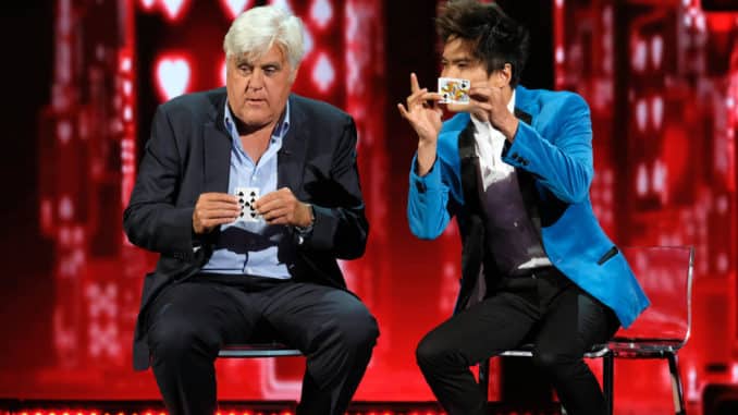 AMERICA'S GOT TALENT -- "Live Results 1" Episode 1413 -- Pictured: (l-r) Jay Leno, Shin Lim -- (Photo by: Justin Lubin/NBC)