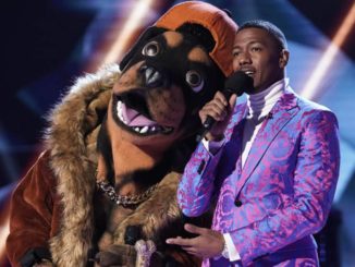 THE MASKED SINGER: L-R: The Rottweiler and host Nick Cannon in the all-new ?Mask Us Anything? episode of THE MASKED SINGER airing Wednesday, Nov. 6 (8:00-9:00 PM ET/PT) on FOX. © 2019 FOX MEDIA LLC. CR: Jack Zeman / FOX.