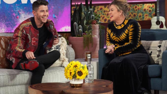 THE KELLY CLARKSON SHOW -- Episode 3053 -- Pictured: (l-r) Nick Jonas, Kelly Clarkson -- (Photo by: Adam Christopher/NBCUniversal)