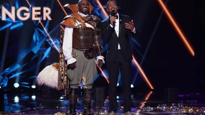 THE MASKED SINGER: L-R: Wayne Brady and host Nick Cannon in the “Road to the Finals / Season Finale: And The Winner Takes It All and Takes It Off” two-hour season finale episode of THE MASKED SINGER airing Wednesday, Dec. 18 (8:00-10:00 PM ET/PT) on FOX. CR: Lisa Rose / FOX ©2020 FOX MEDIA LLC.