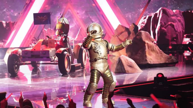 The Masked Singer: Sing-Along Spectacular: The Astronaut in the “The Masked Singer: Sing-Along Spectacular” episode of THE MASKED SINGER airing Wednesday, April 15 (8:00-9:01 PM ET/PT) on FOX. CR: FOX. © 2020 FOX MEDIA LLC.