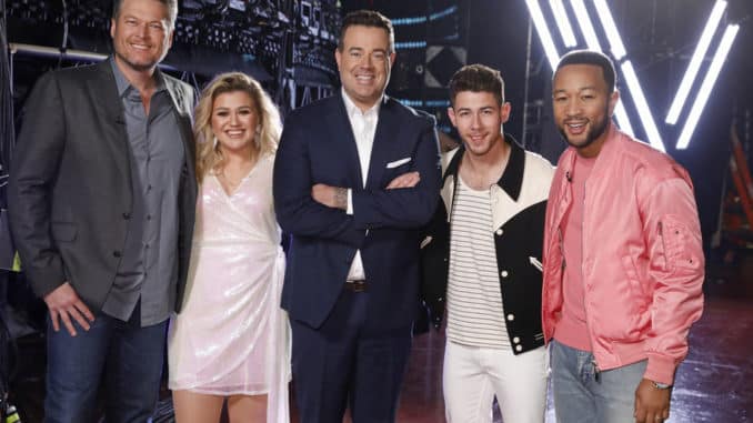 THE VOICE -- "Knockout Rounds" Episode 1809 -- Pictured: (l-r) Blake Shelton, Kelly Clarkson, Carson Daly, Nick Jonas, John Legend -- (Photo by: Trae Patton/NBC)