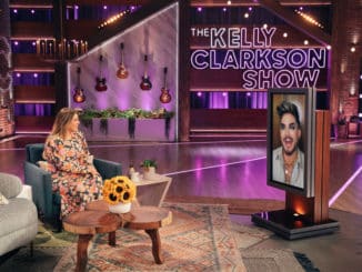 THE KELLY CLARKSON SHOW -- Episode 4090 -- Pictured: (l-r) Kelly Clarkson, Adam Lambert (on screen) -- (Photo by: Weiss Eubanks/NBCUniversal)