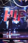 THE MASKED SINGER:  Host Nick Cannon and Hippo in the "Mask On Face Off" series premiere of THE MASKED SINGER airing Wednesday, Jan 2 (9:00-10:00 PM ET/PT) on FOX. © 2019 FOX Broadcasting.  CR: Michael Becker / FOX.